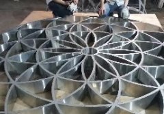 Hand-welded arc flower